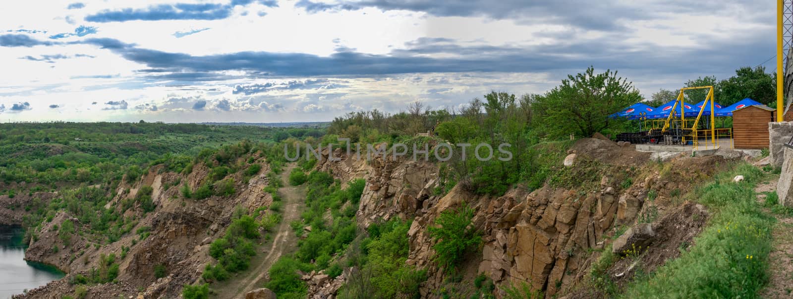 Migeya, Ukraine - 05.13.2019. Radon Lake in a place of flooded granite quarry near the Southern Bug river in Mygiya village, Ukraine