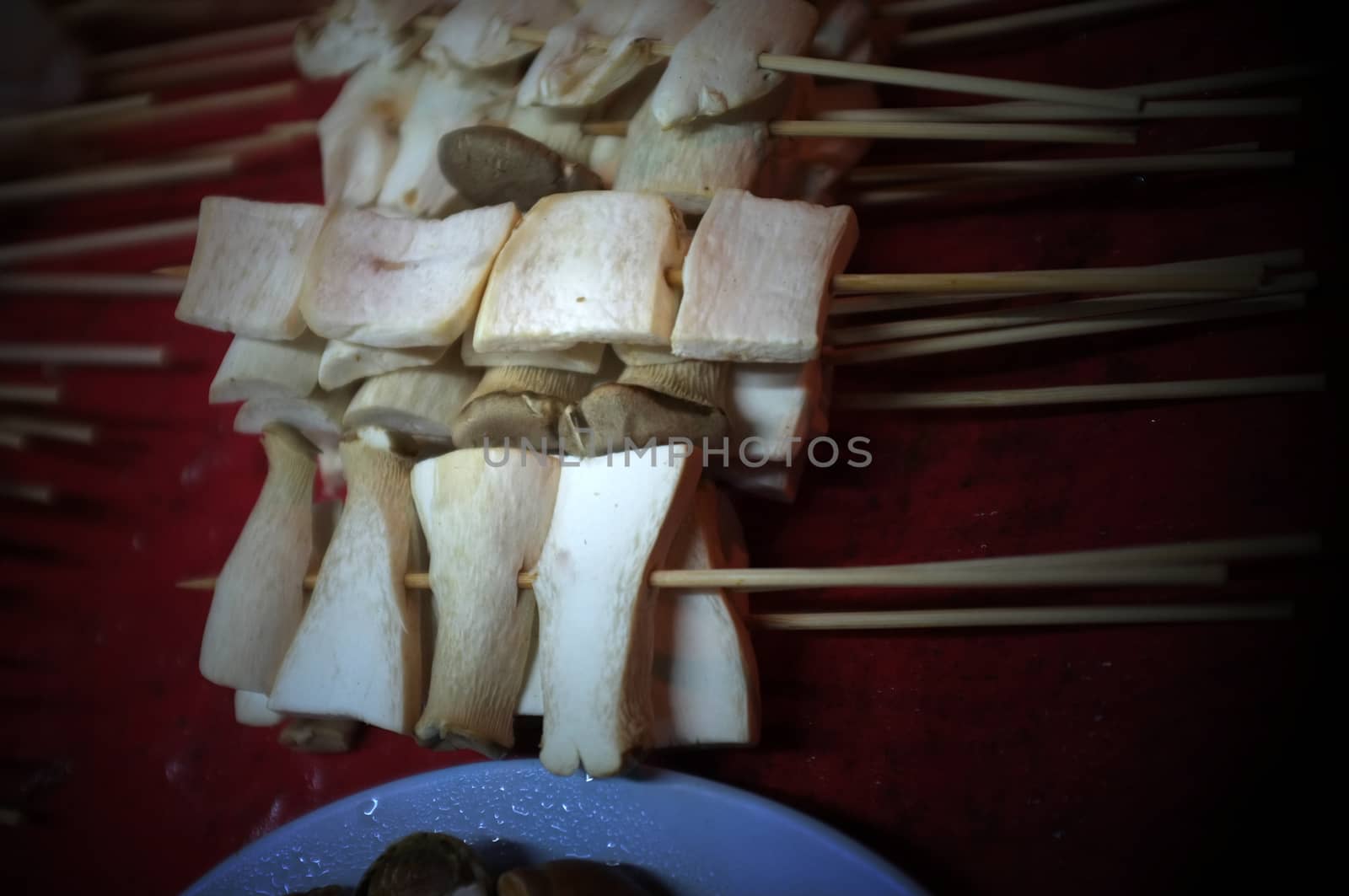 Asian street food Grilled with Chinese Sichuan Peppers (Ma-la) style , Seller prepare for meals, balls, seafoods and vegetables grill with Sichuan pepper.Thai Street food