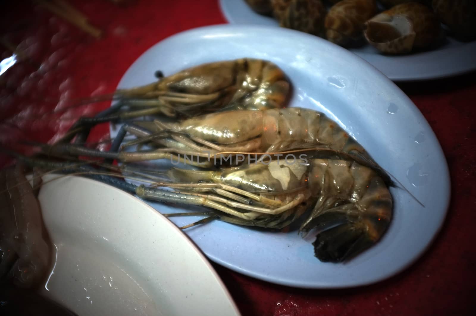 Asian street food Grilled with Chinese Sichuan Peppers (Ma-la) style , Seller prepare for meals, balls, seafoods and vegetables grill with Sichuan pepper.Thai Street food