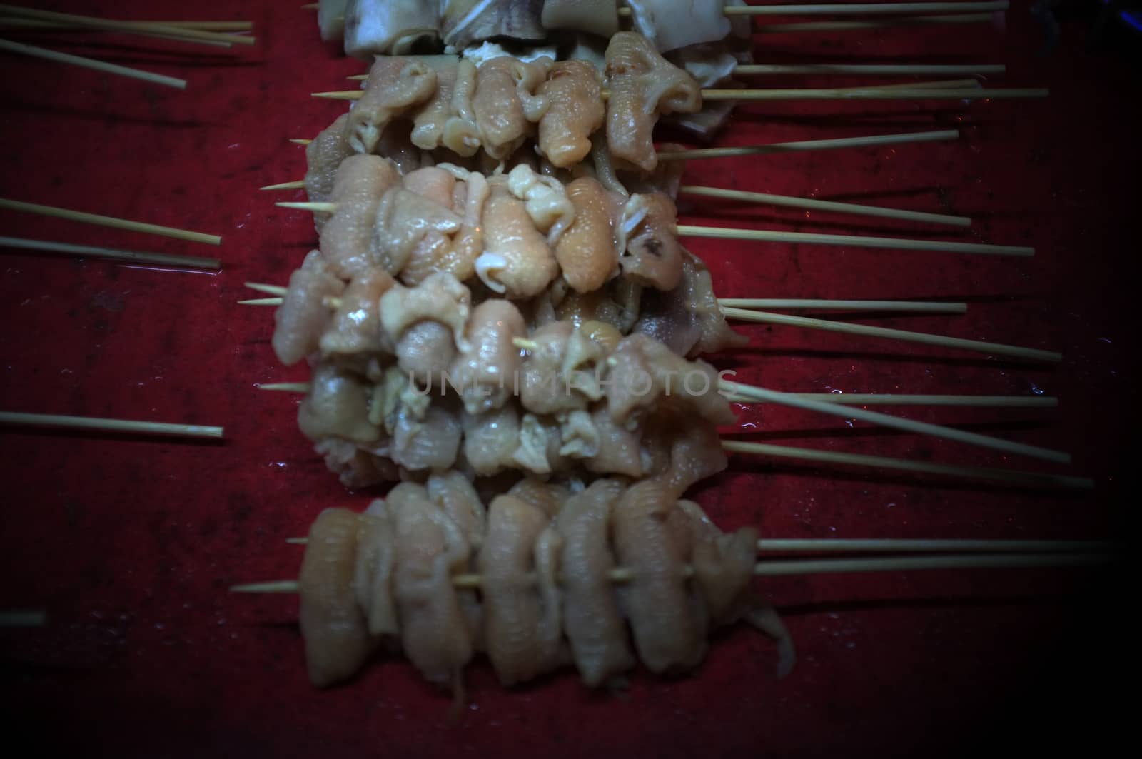 Asian street food Grilled with Chinese Sichuan Peppers (Ma-la) style , Seller prepare for meals, balls, seafoods and vegetables grill with Sichuan pepper.Thai Street food
