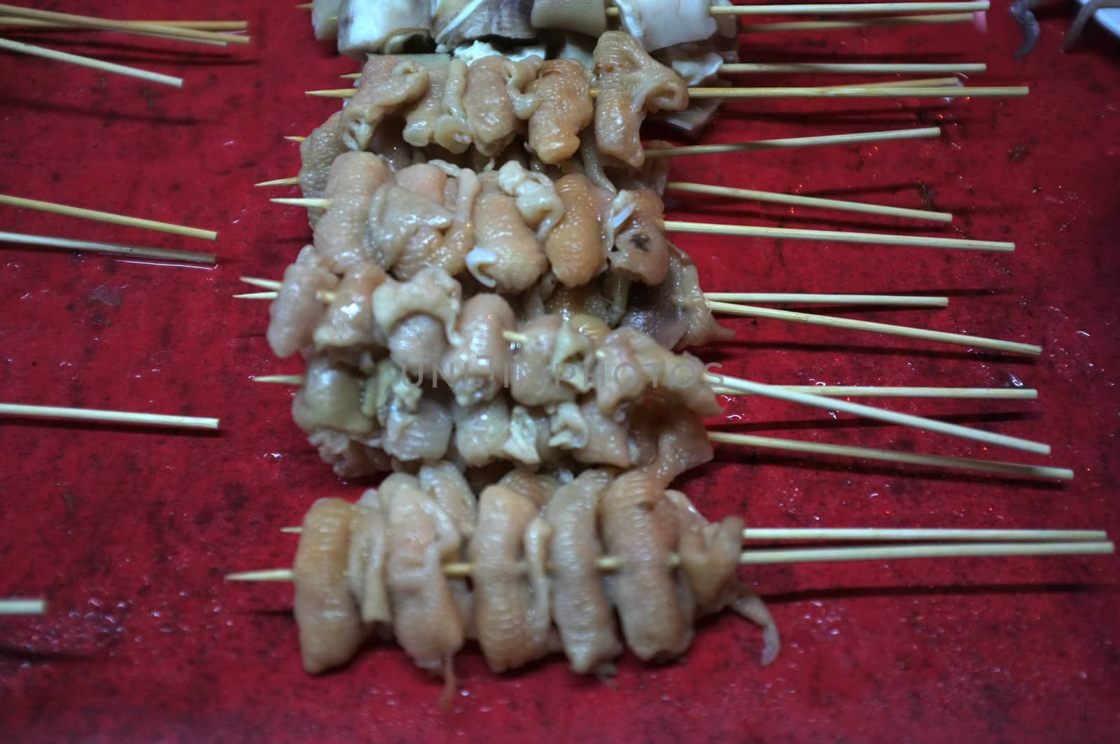 Asian street food Grilled with Chinese Sichuan Peppers (Ma-la) style , Seller prepare for meals, balls, seafoods and vegetables grill with Sichuan pepper.Thai Street food