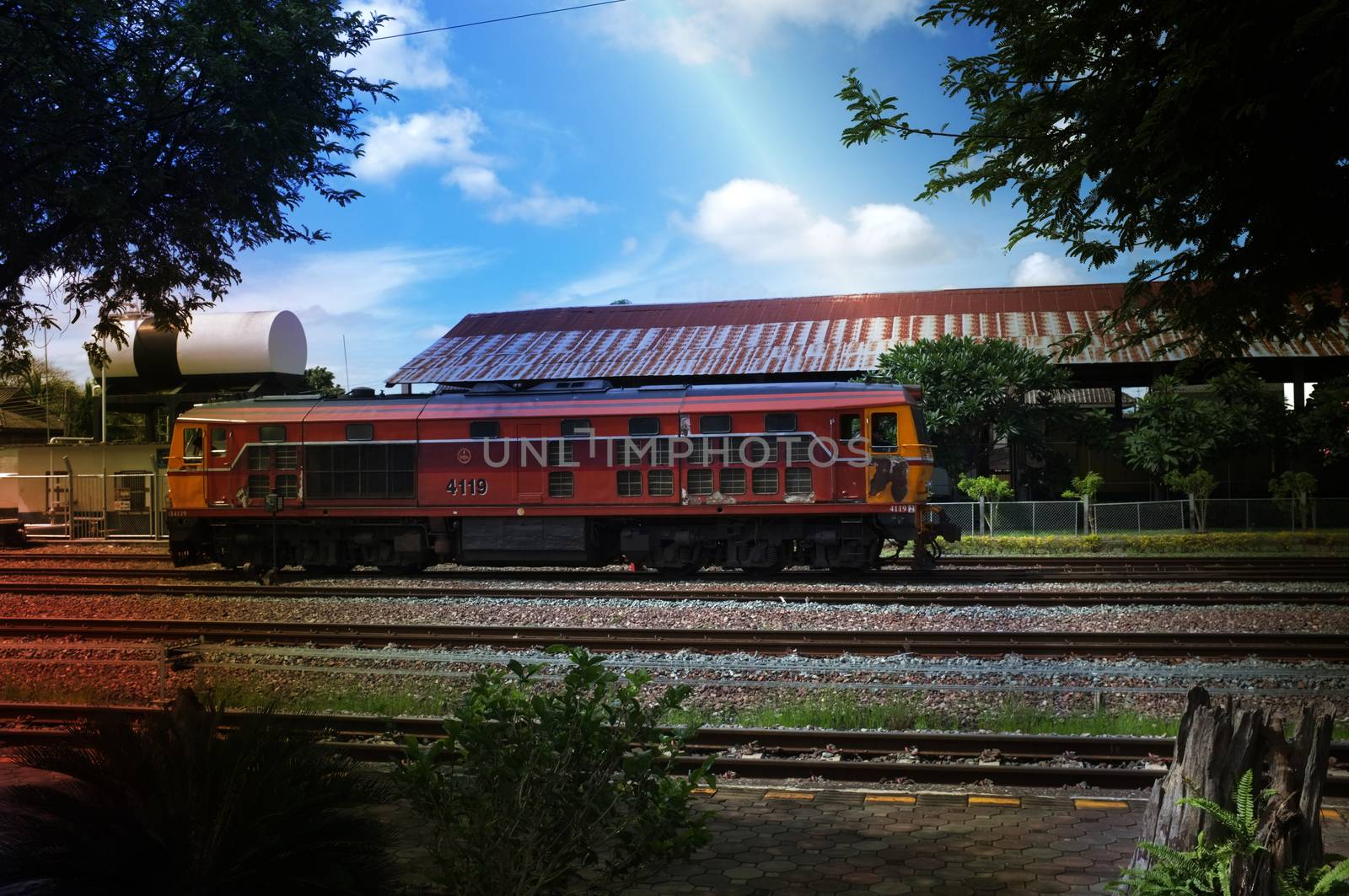 Lampang , Thailand : September 13 2019 : beautiful Diesel electric locomotive with sun light. Lampang station  , Thailand