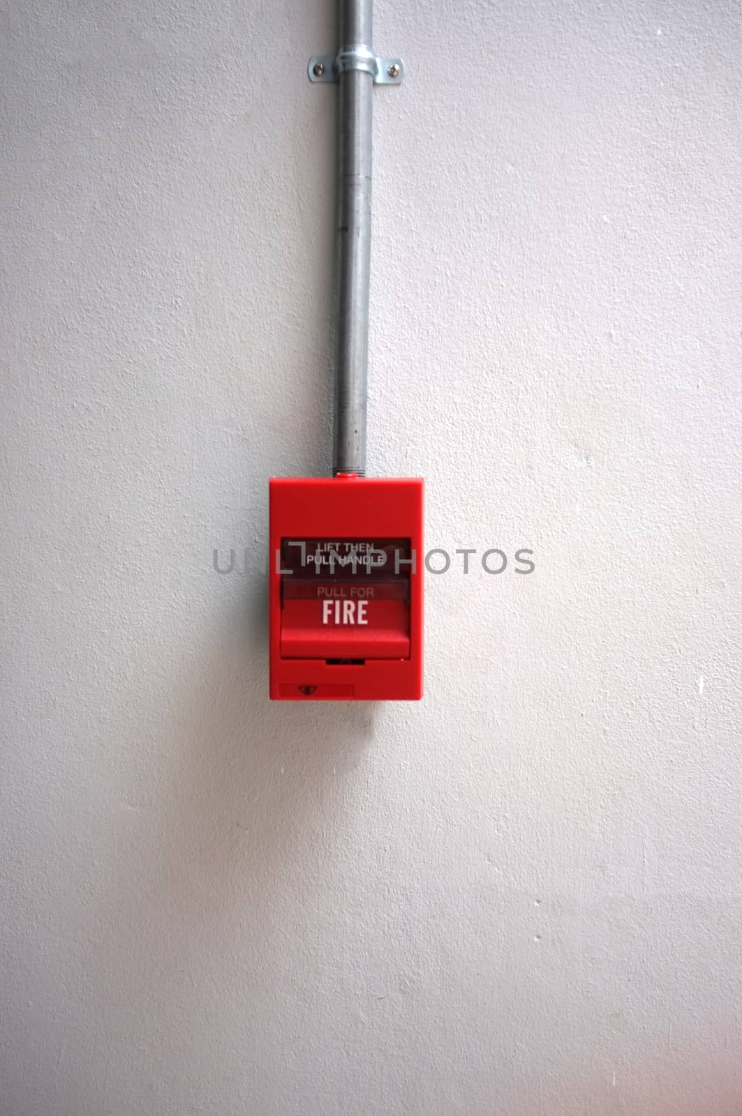 Fire alarm on the wall of shopping center.

