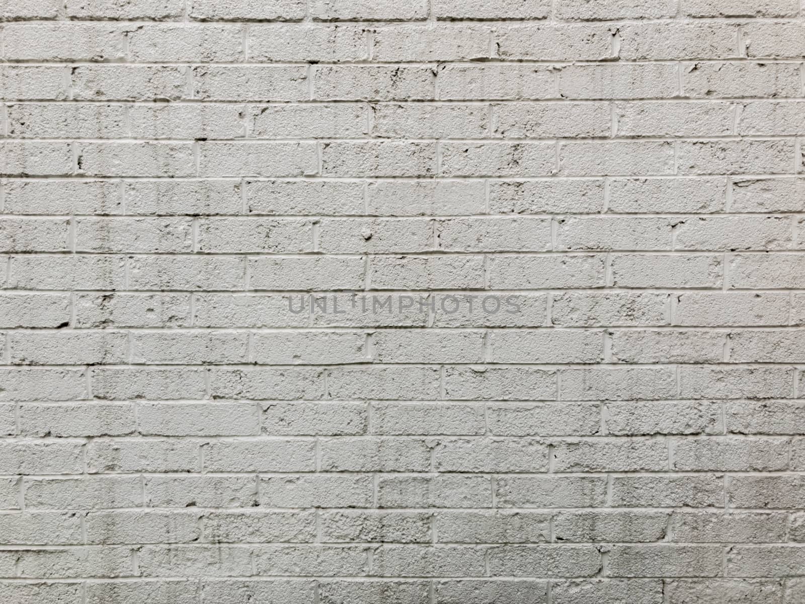 White brick wall for background or texture by leo_de_la_garza