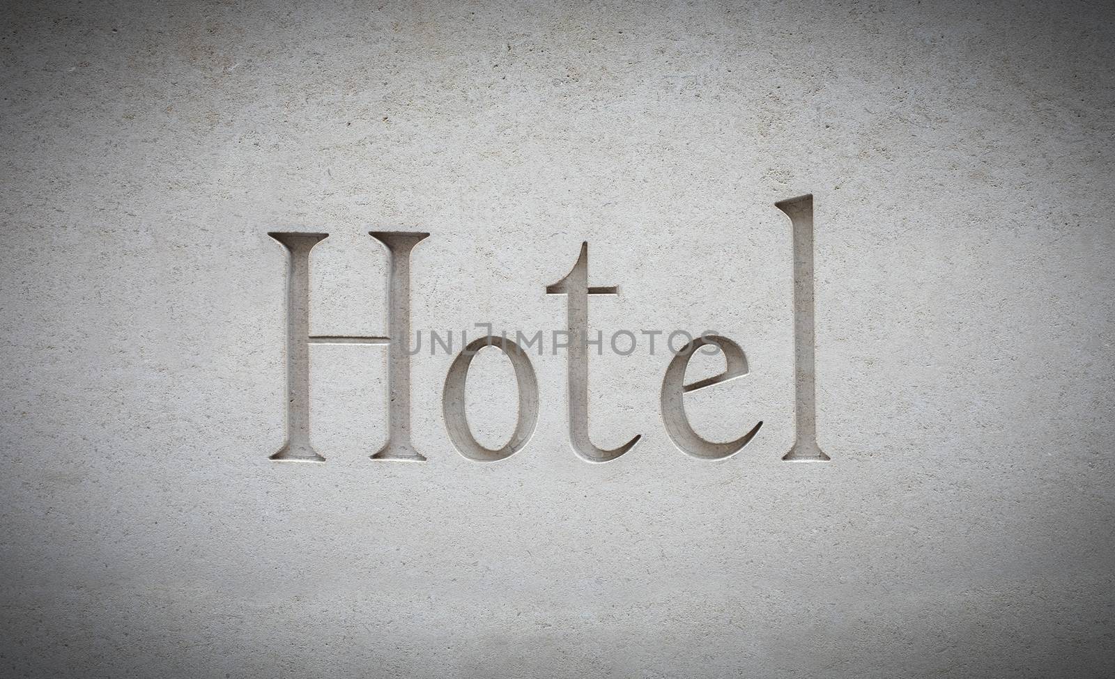 A Sign For A Luxury Contemporary Hotel Engraved In Stone