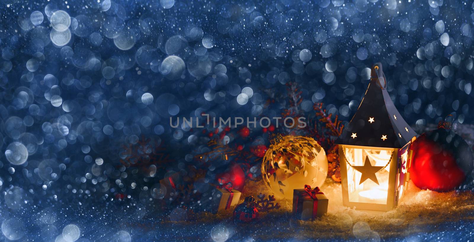 Lantern and christmas decoration on glitter bokeh background