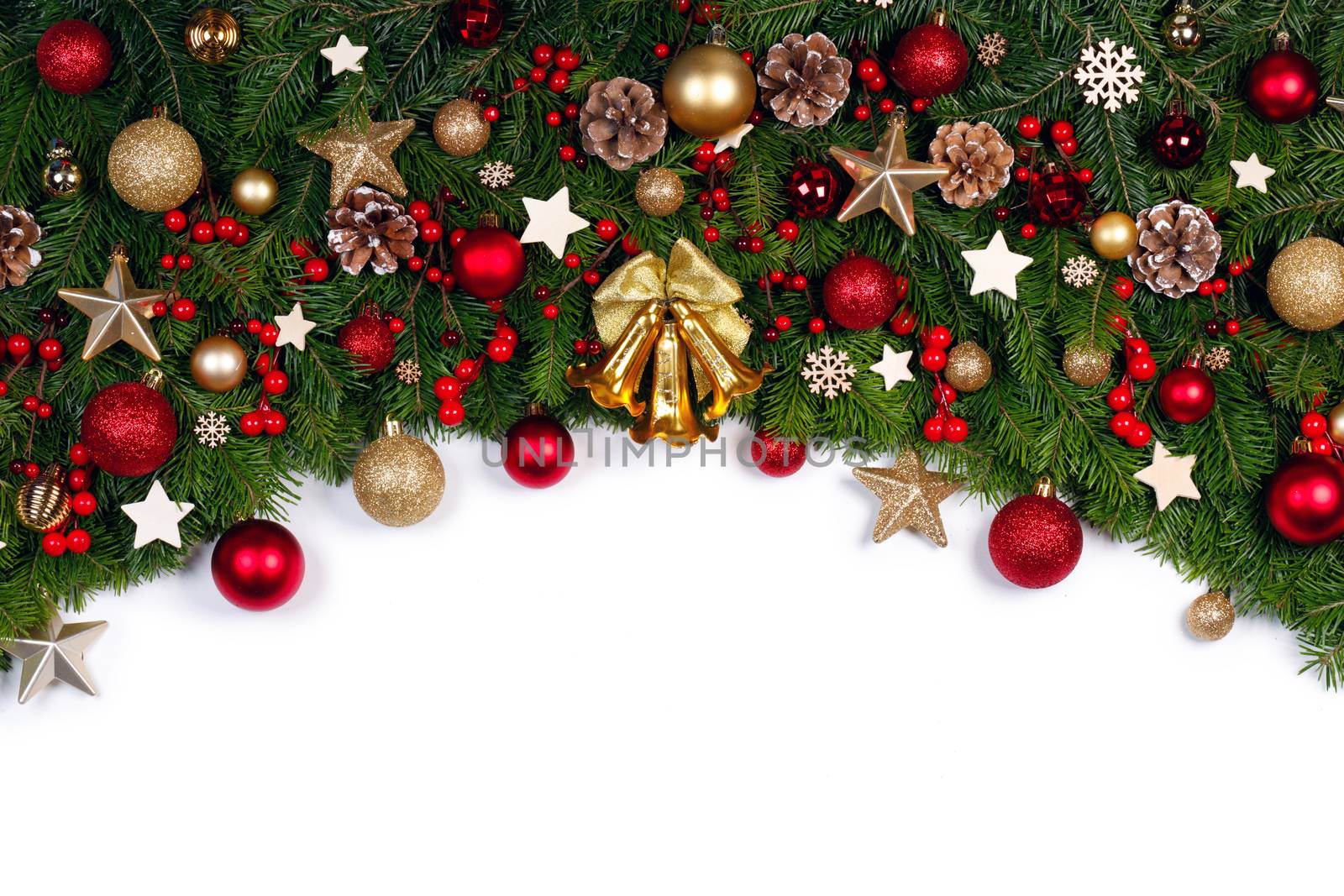 Christmas Border frame of tree branches on white background with copy space isolated, red and golden decor, berries, stars