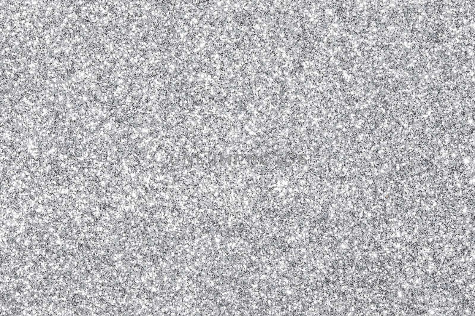 Shiny silver bokeh glitter lights abstract background, Christmas New Year party celebration concept