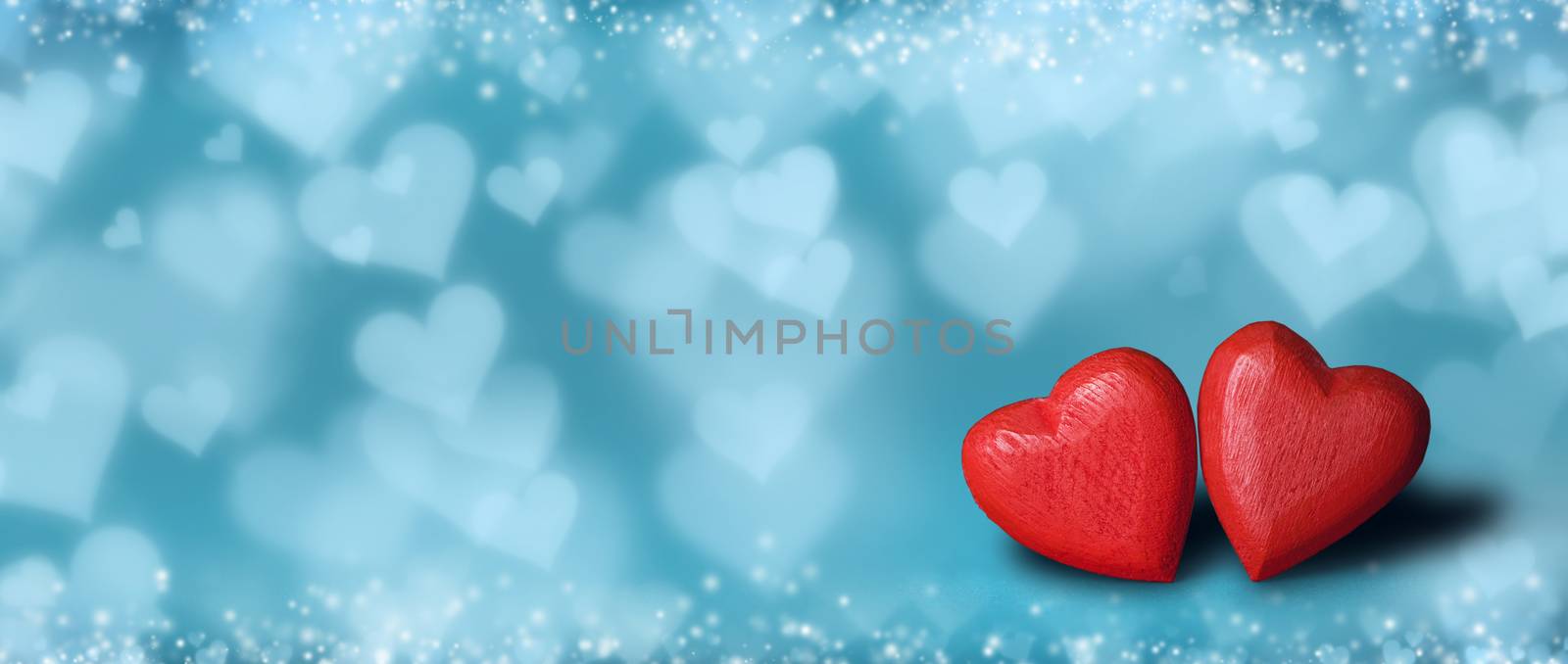 Two red hearts on bokeh background by Yellowj