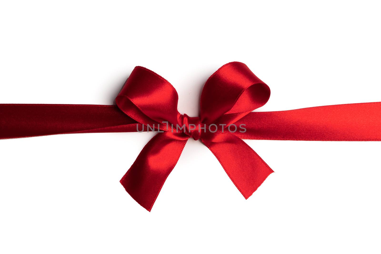 Red gift bow isolated on white background