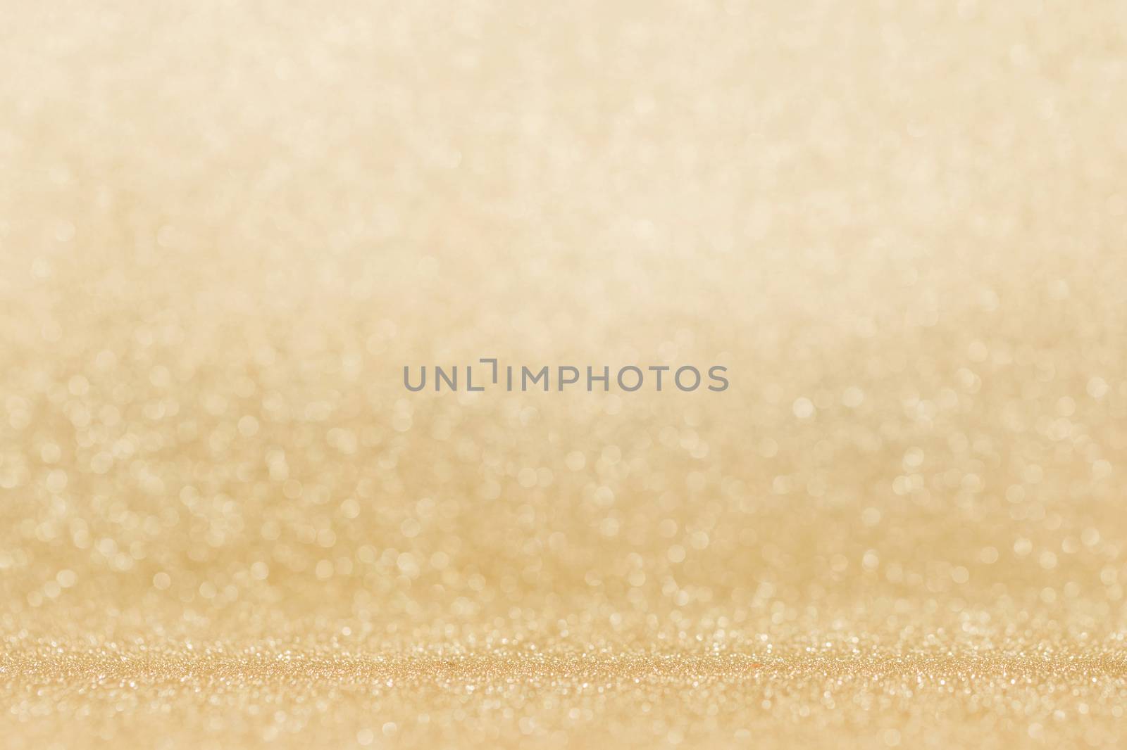 Shiny golden bokeh glitter lights abstract background, Christmas New Year party celebration concept