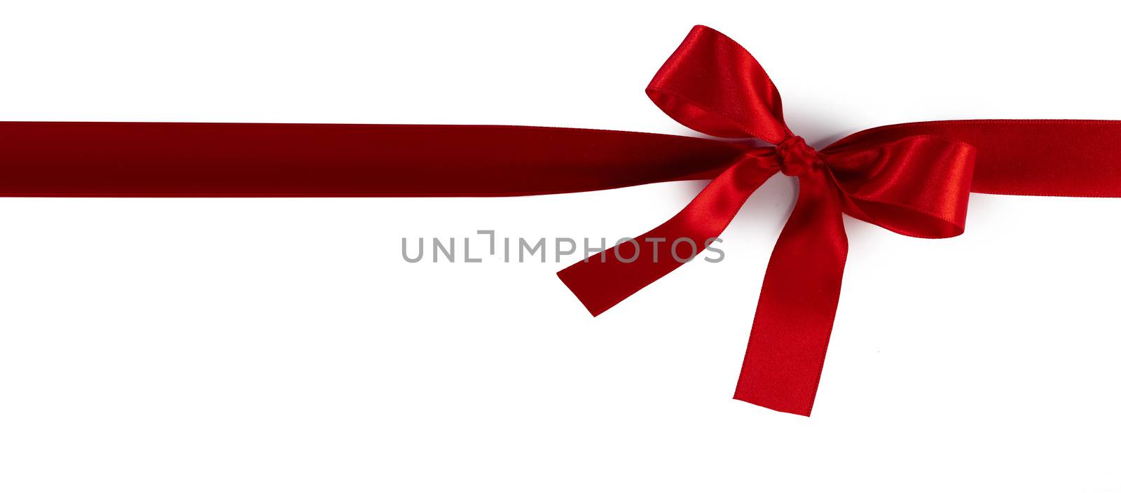 Red gift bow isolated on white background