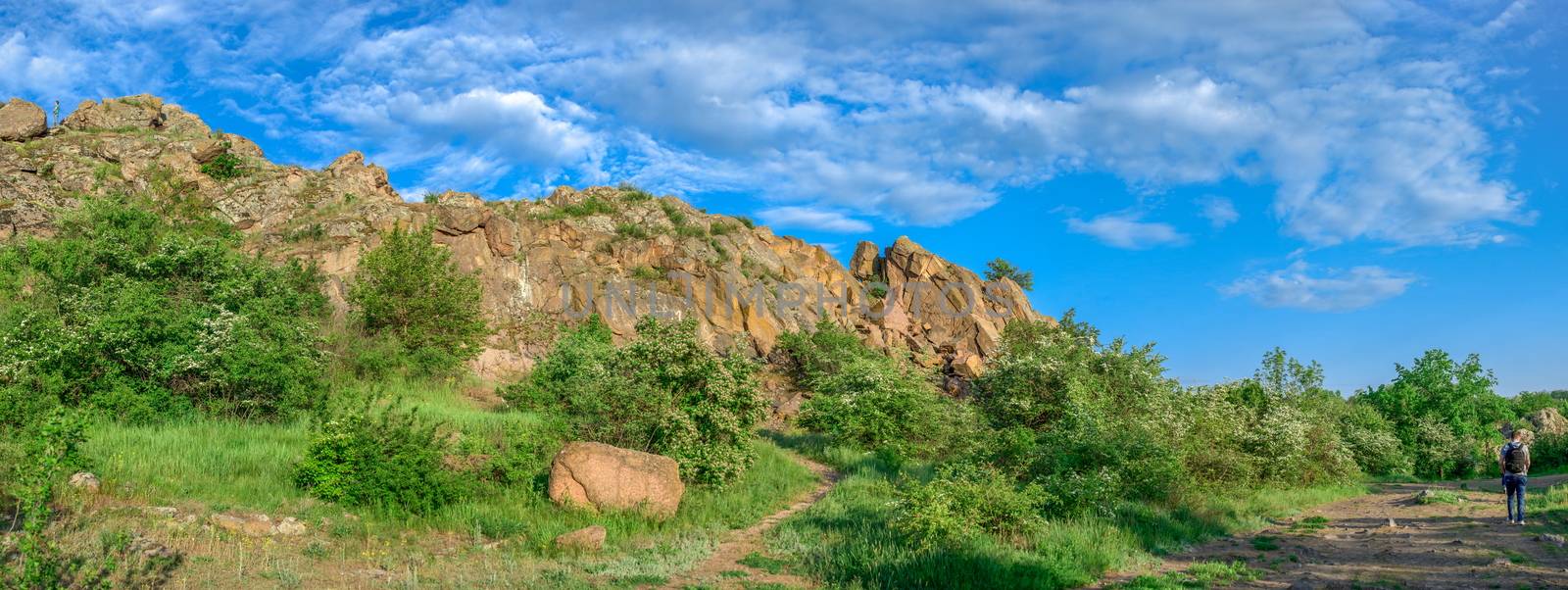 The rocky banks of the Southern Bug River near the village of Migiya in Ukraine on a sunny summer day