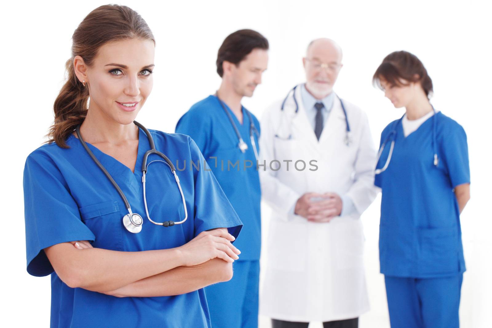 Group of doctors isolated on white background, studio shot