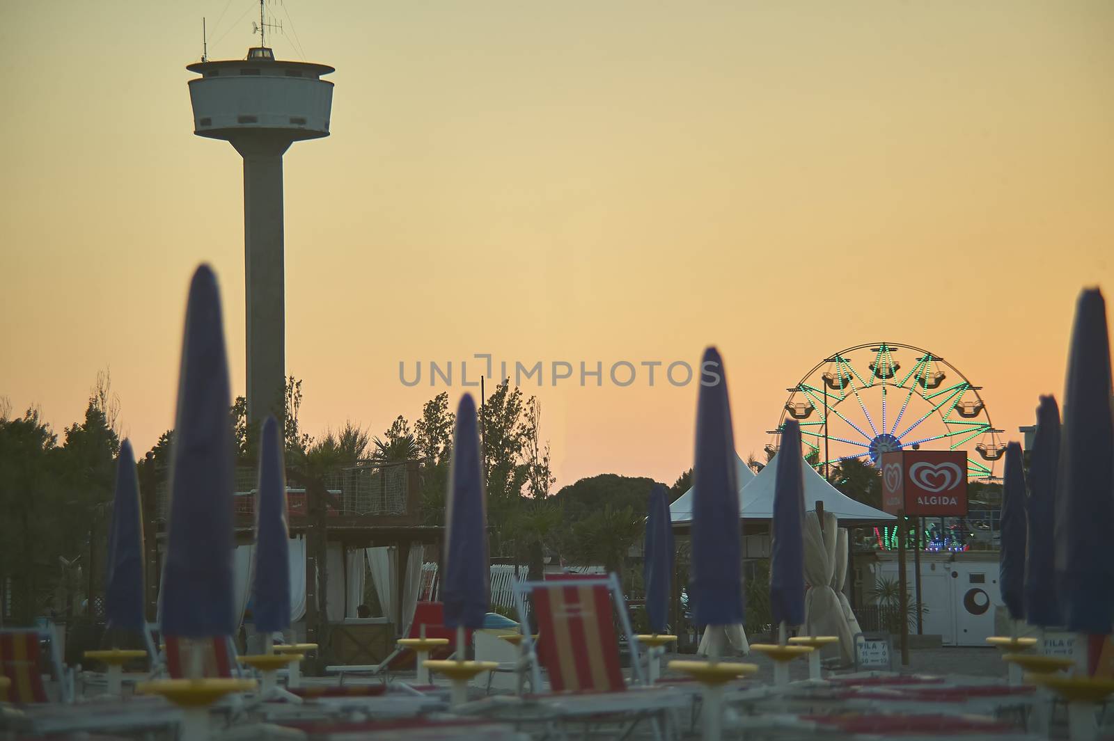 Seaside resort at sunset by pippocarlot