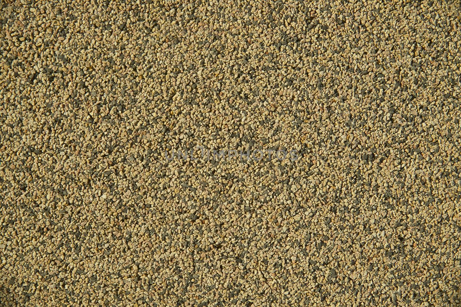 high definition textures of a wall with small pebbles, or trimmed for masonry,