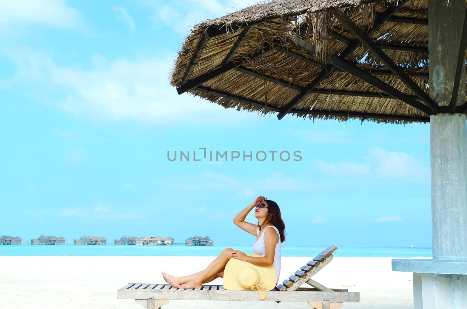 Portrait of happy  woman at  Maldives island. Travel and Vacation. 