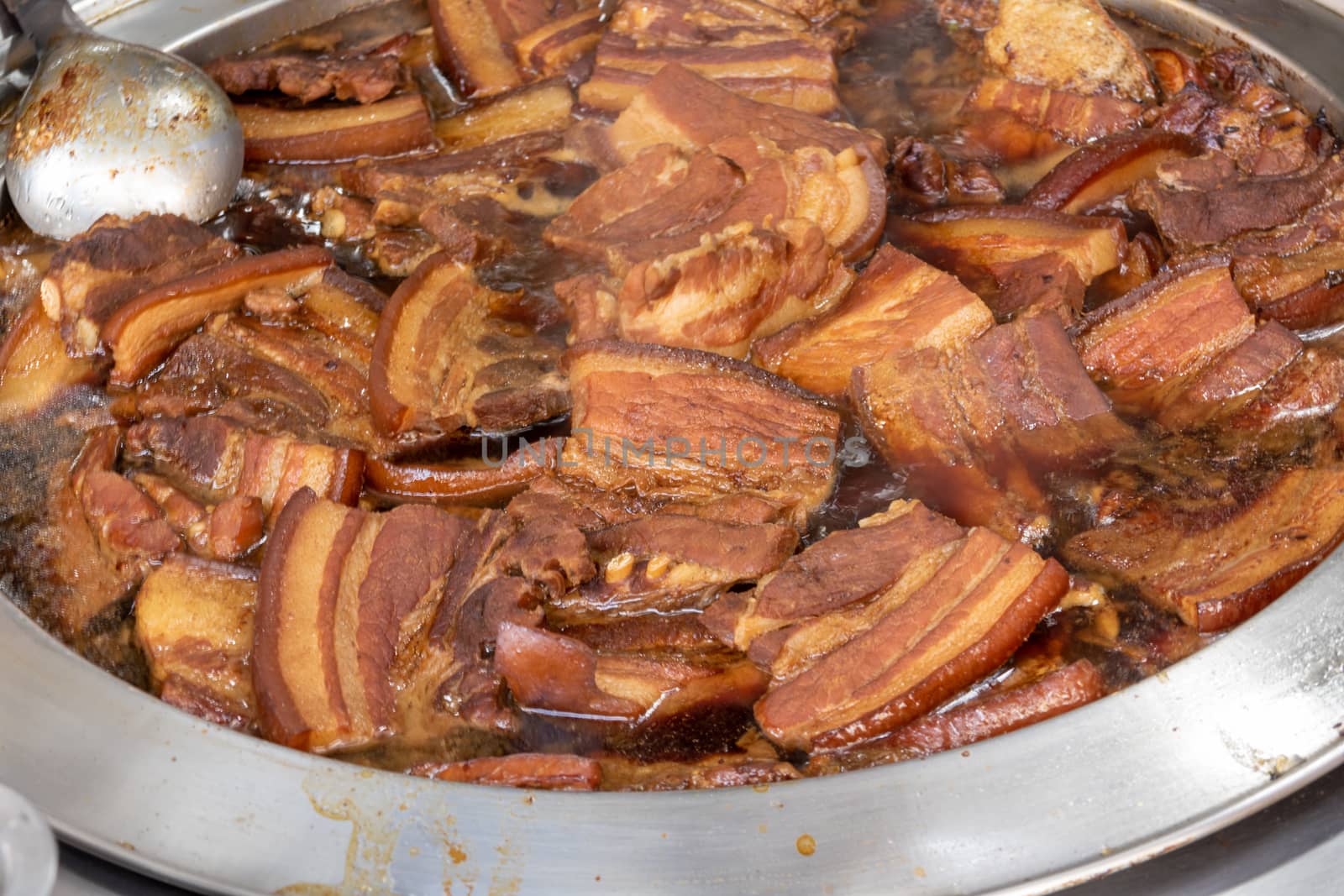 Chinese braised pork cooking in pot