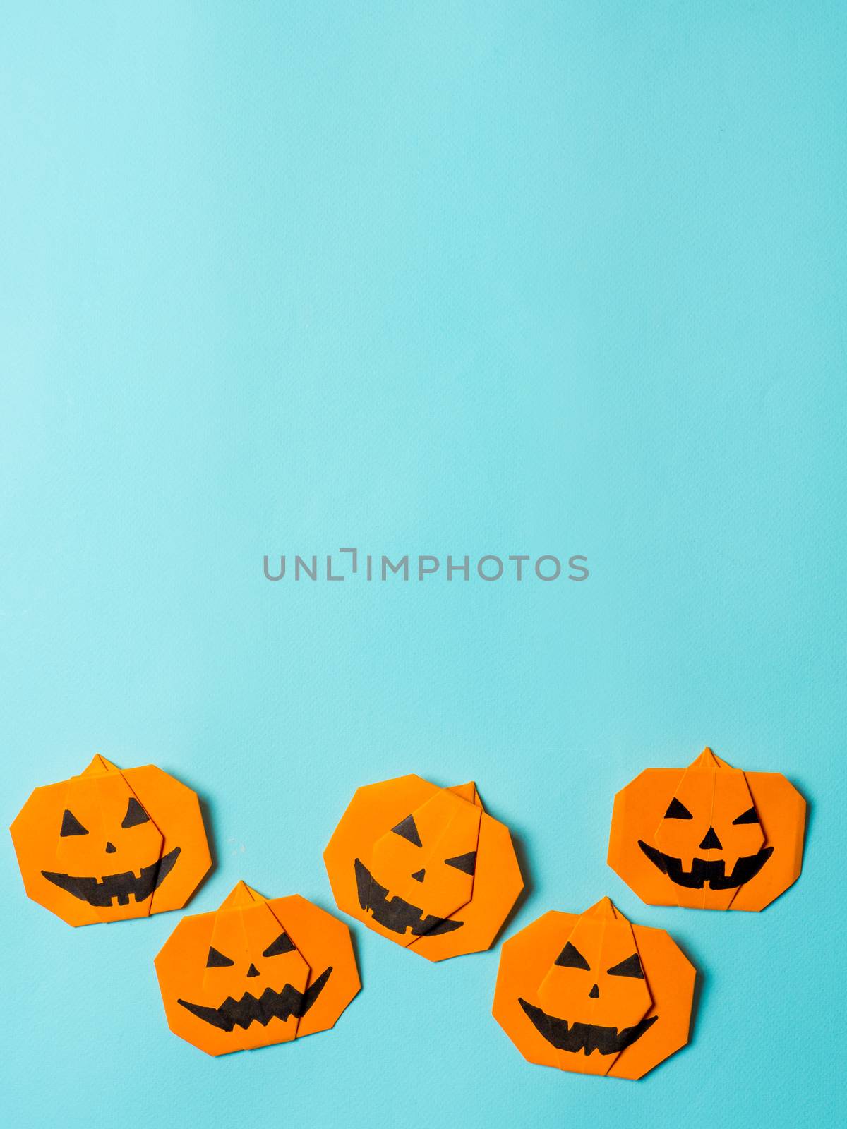 Halloween concept,paper origami pumpkin, copyspace by fascinadora