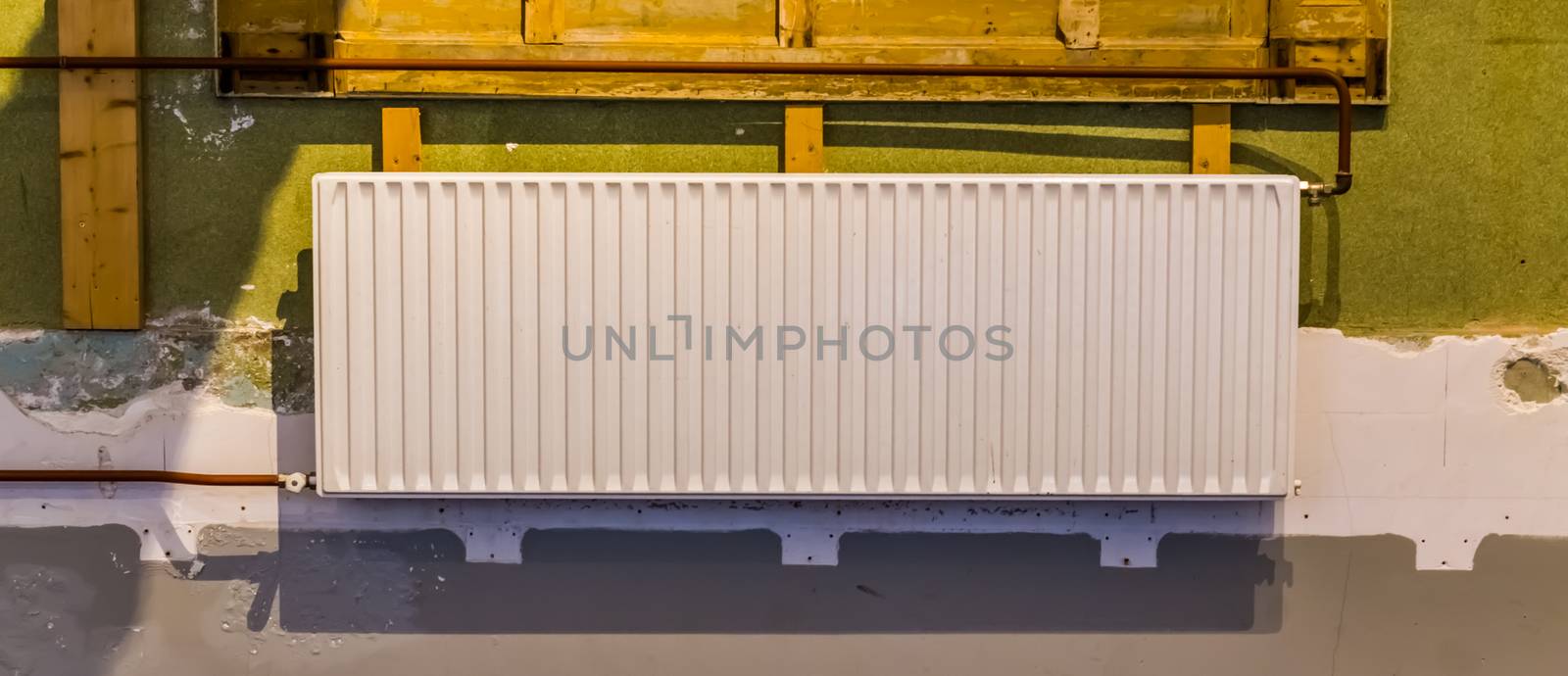 closeup of a white home radiator, typical indoor climate control, Classical house architecture