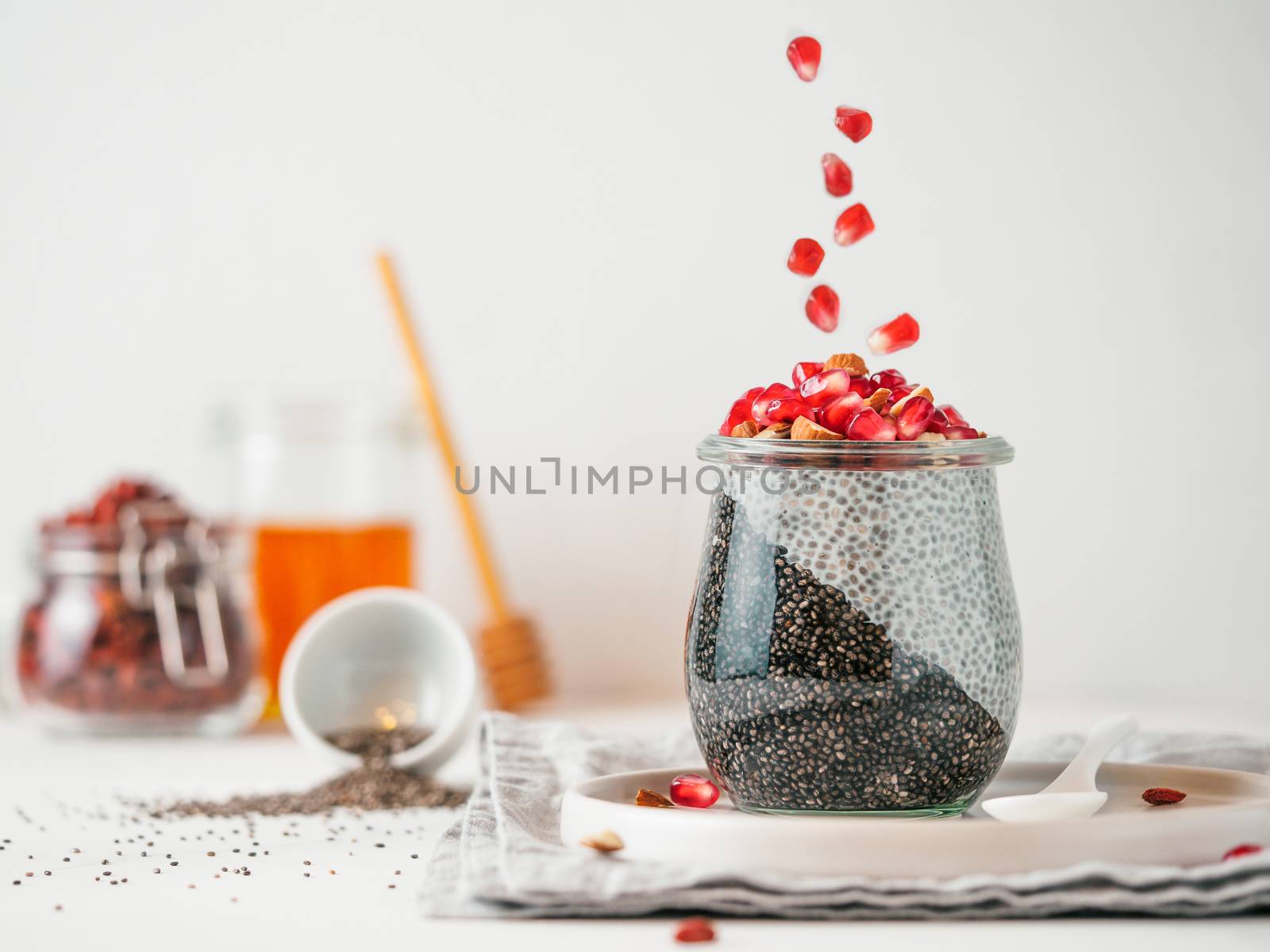 two colors chia pudding, pomegranate, copy space by fascinadora