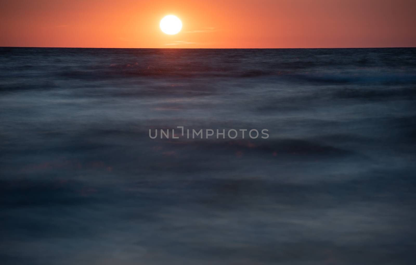 Baltic sea at beautiful sunset in Miedzyzdroje beach, city where the festival of stars takes place every year . Polish baltic coast. Famous city among the tourist.