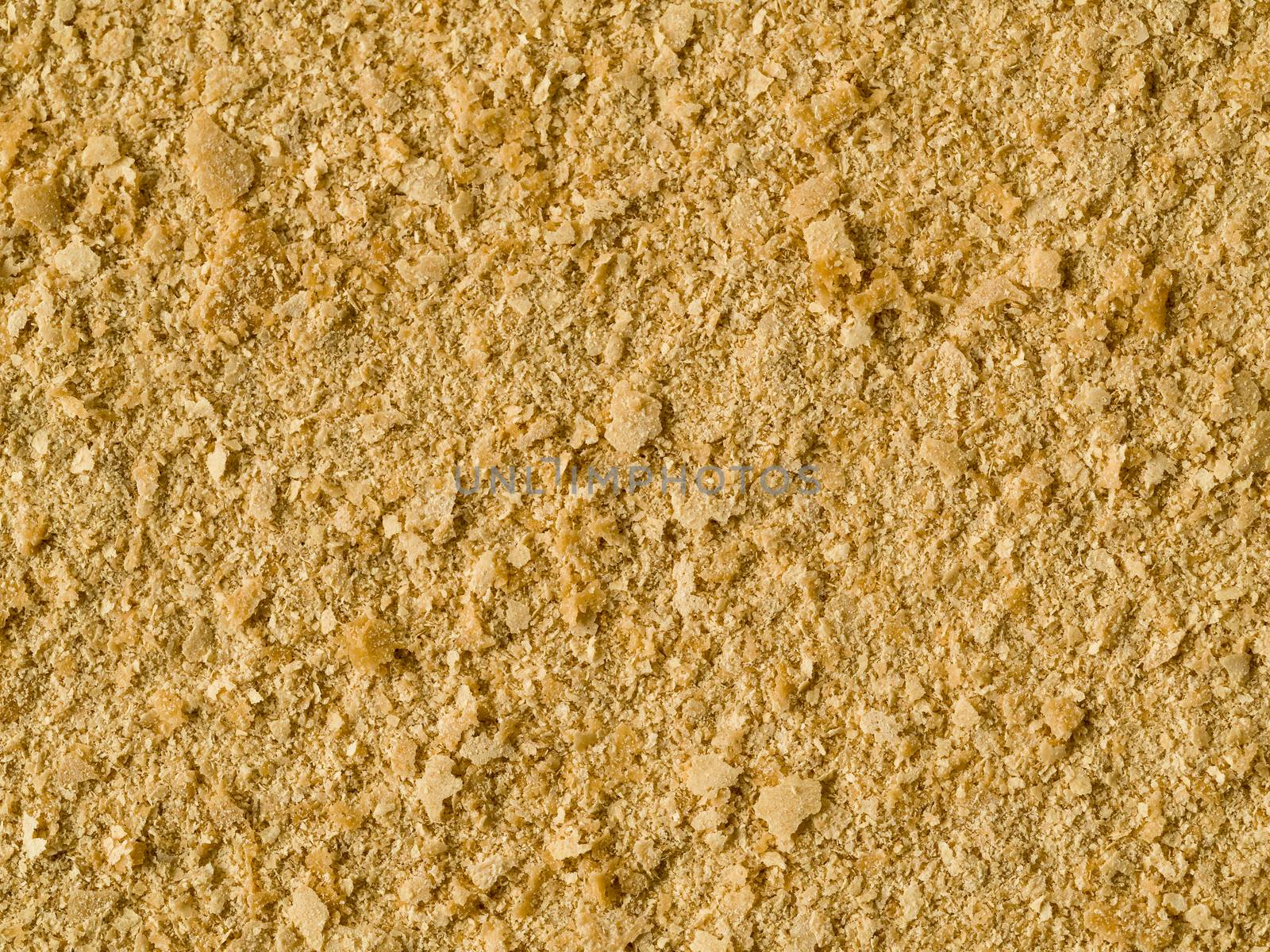 Nutritional yeast background. Nutritional inactive yeast top view. Copy space. Nutritional yeast is vegetarian superfood with cheese flavor, for healthy diet