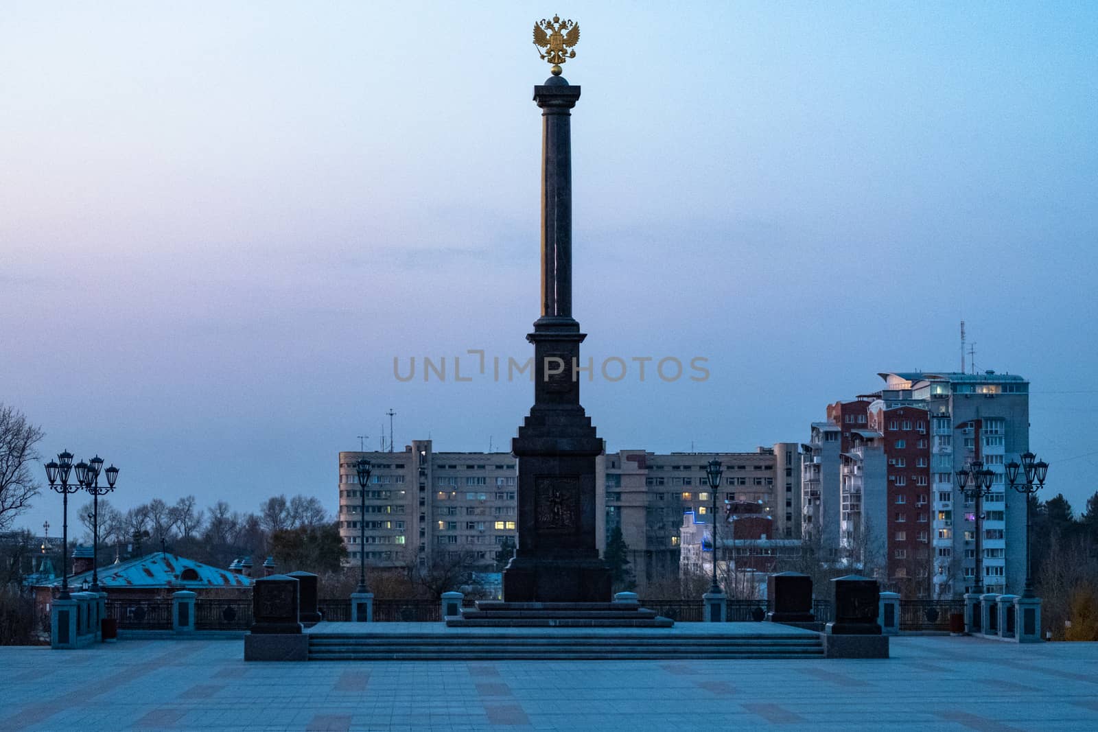 Komsomolskaya square of Khabarovsk at night by the light of lanterns.