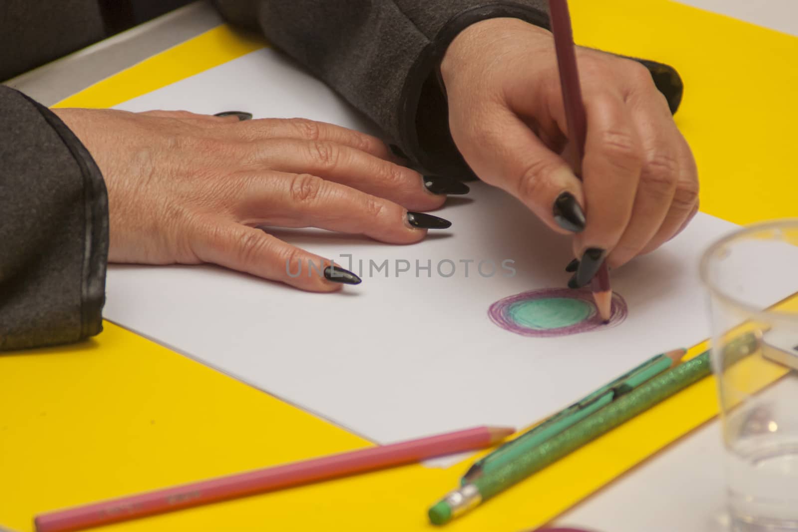 hand drawing on a white sheet with colored pencils,