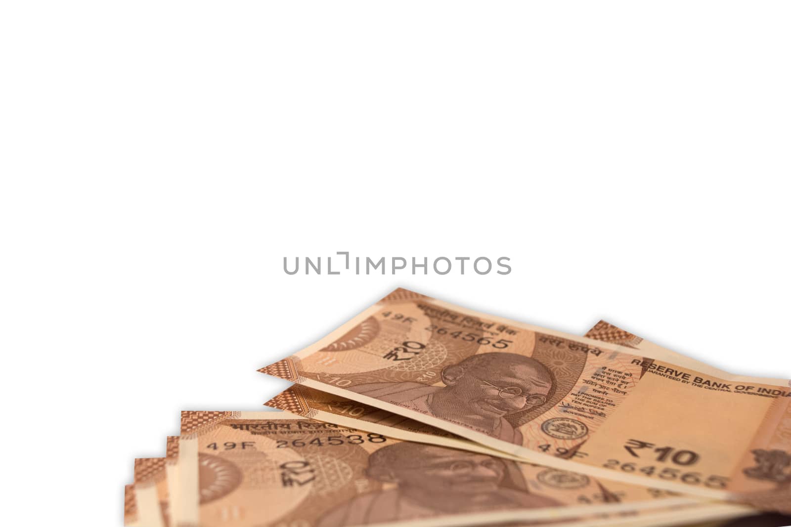 New Indian 10 Rupee currency notes on isolated background. by lakshmiprasad.maski@gmai.com