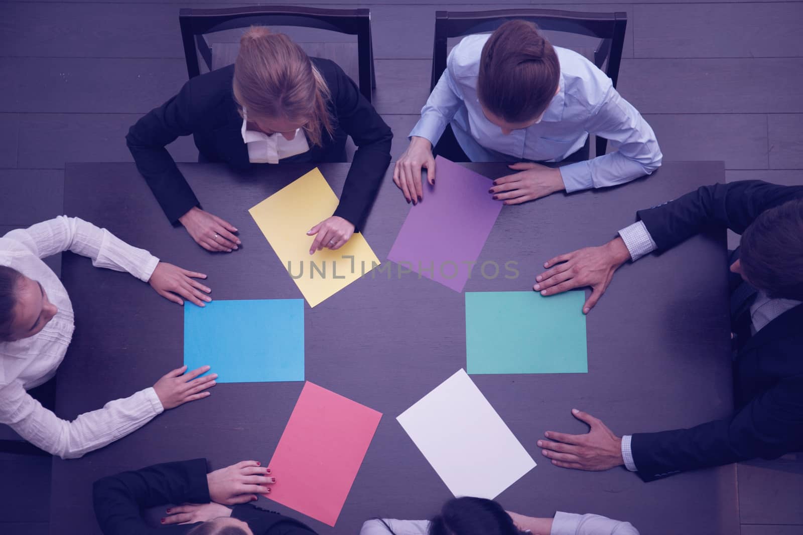 Group of business people with blank colorful paper, new project concept