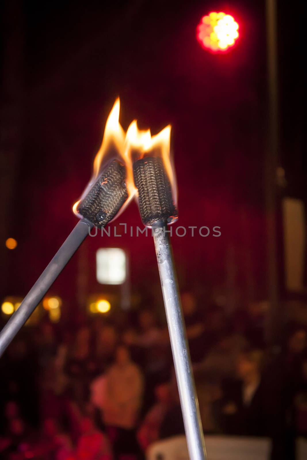 Torches burned with flames used by jugglers in a show