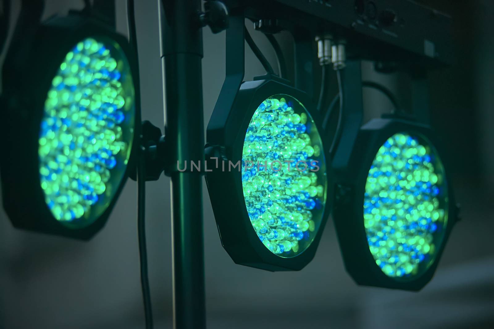 Detail of colored LED spotlights used to illuminate a stage stage of a concert