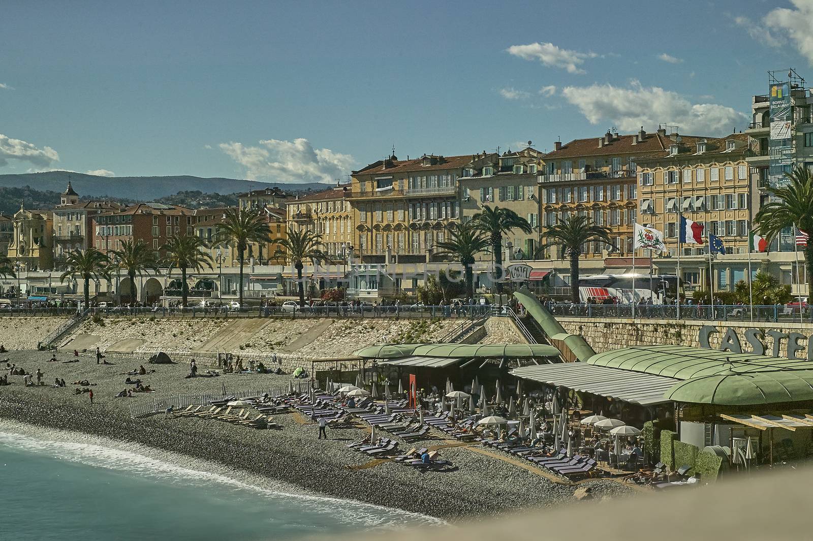 Seaside resort on Nice beach in France during summer time. A breathtaking landscape.