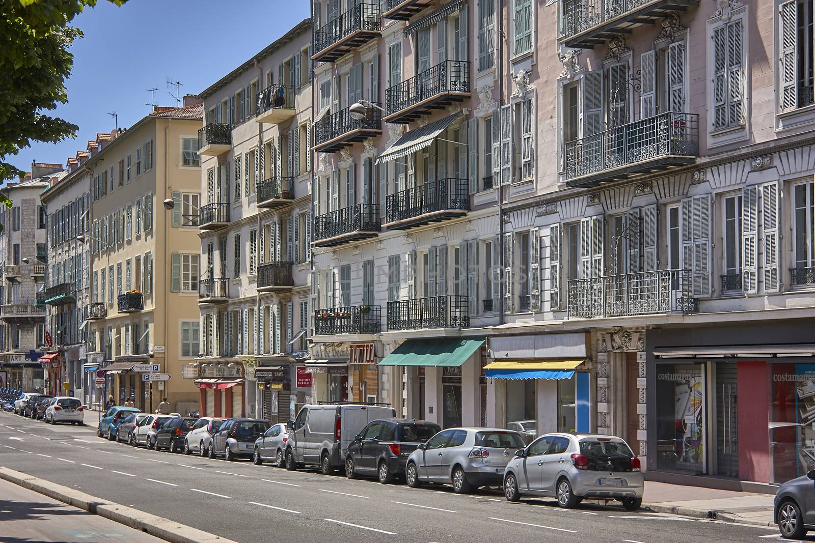 Scene of daily life in one of the most beautiful and suggestive streets of Nice in France.