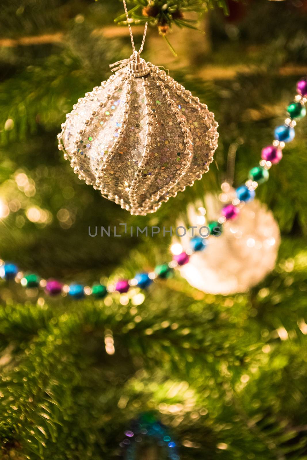 Closeup of Christmas-tree decorations shiny light