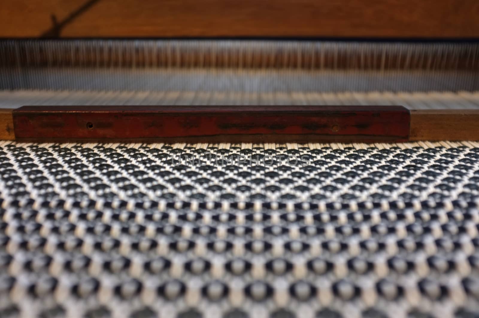 Close up Important tools used in weaving are called loom , Concept Weaving traditional thai fabric