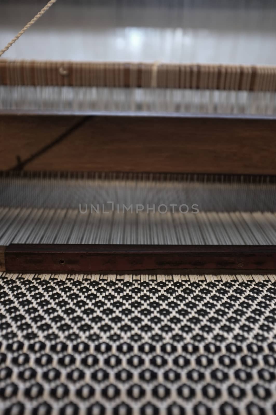 Close up Important tools used in weaving are called loom , Concept Weaving traditional thai fabric