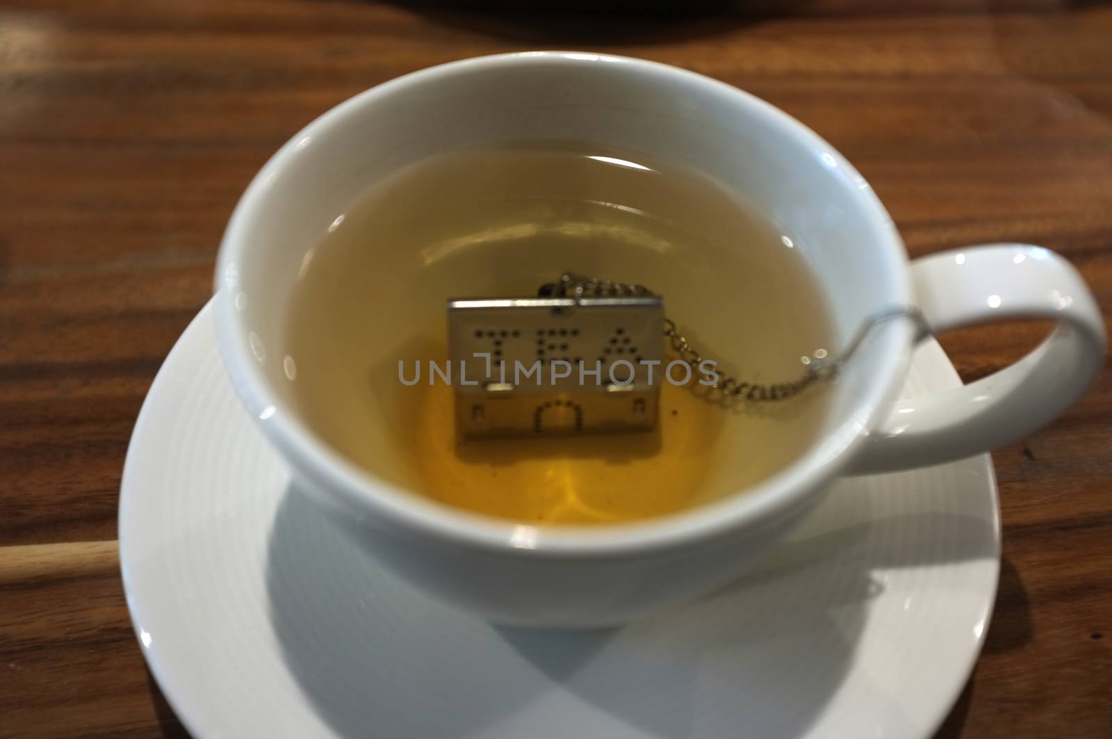 Cup of tea with House Shape Tea Strainers Stainless Steel Tea Infusers