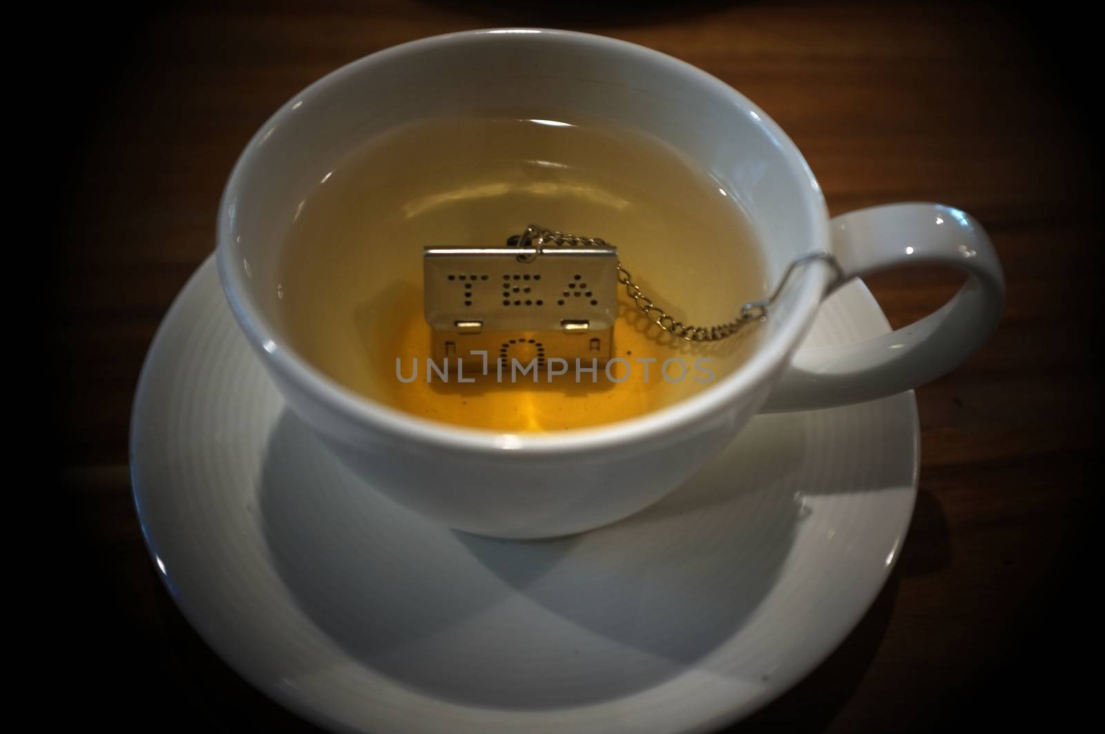Cup of tea with House Shape Tea Strainers Stainless Steel Tea Infusers