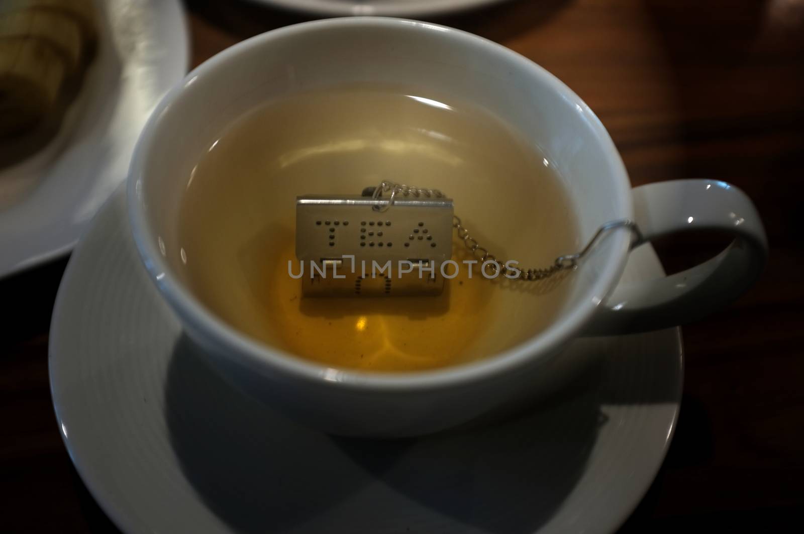 Cup of tea with House Shape Tea Strainers Stainless Steel Tea Infusers