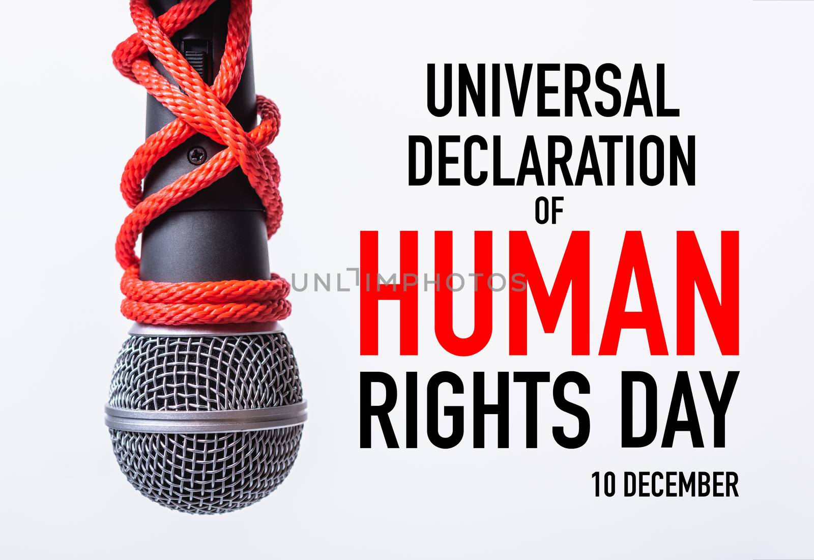 Rope and chain on fist hand with world HUMAN RIGHTS DAY 10 DECEM by Sorapop