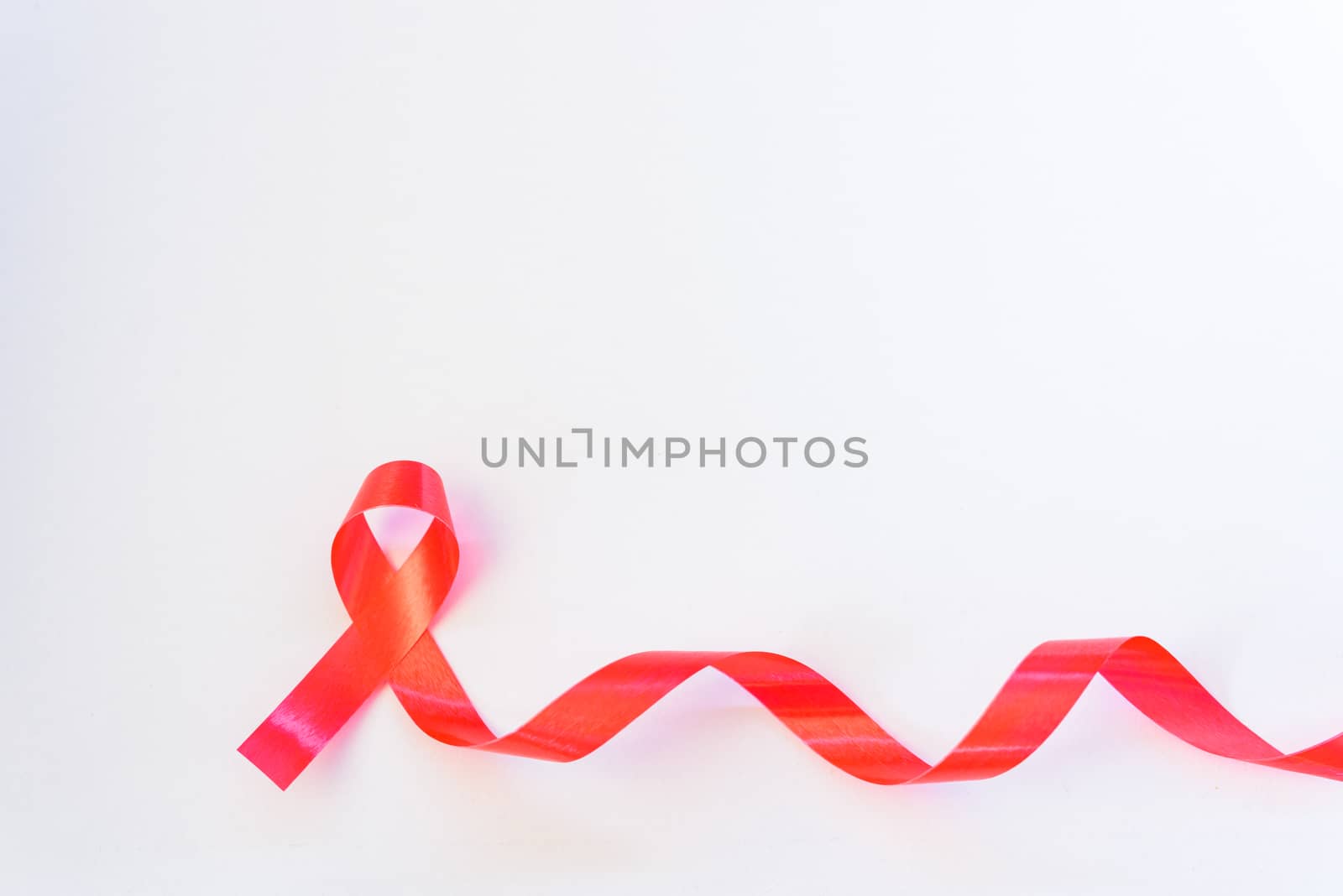 Red Ribbon Support HIV, AIDS on white background and copy space for use