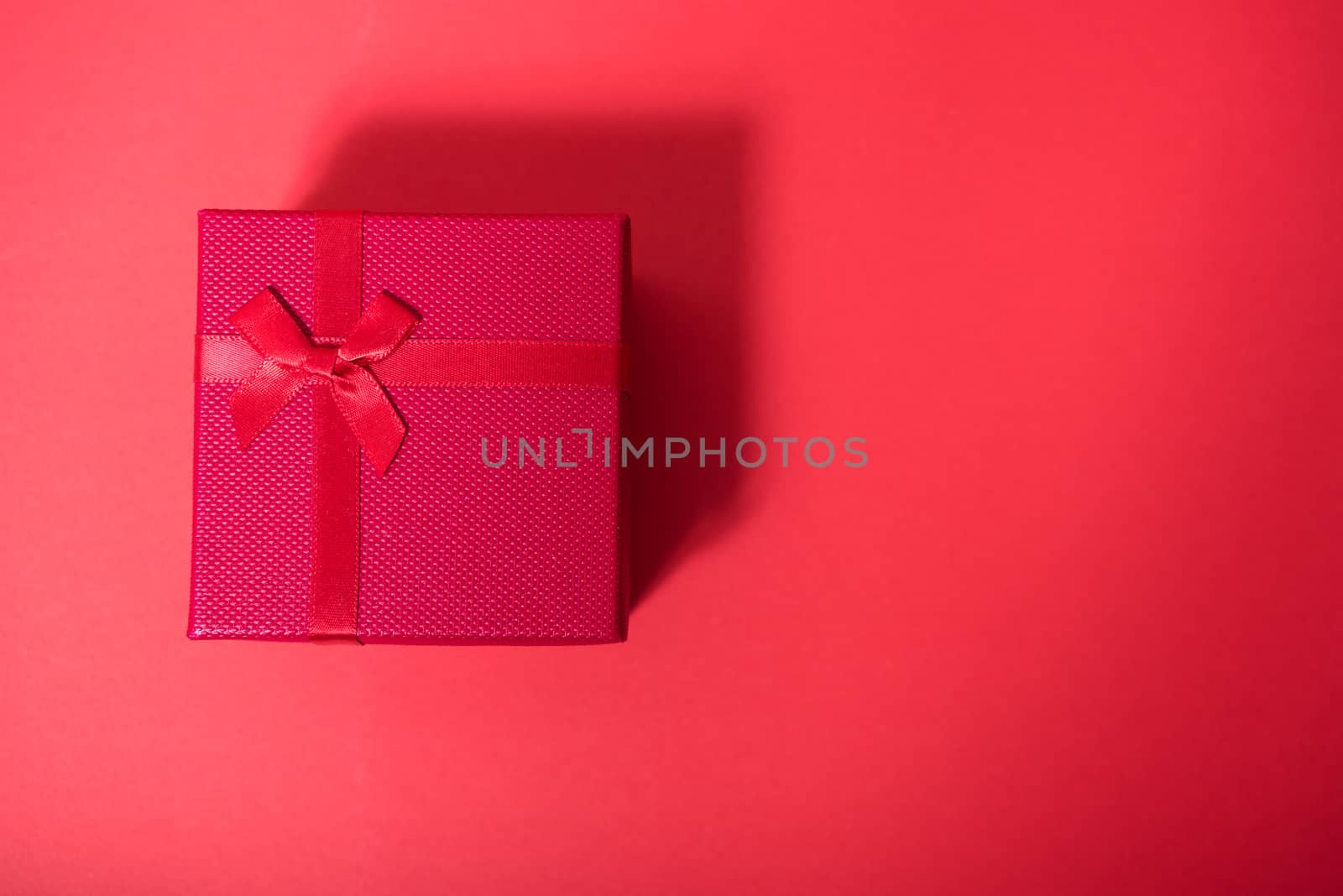 Top view close up Red gift box on red background