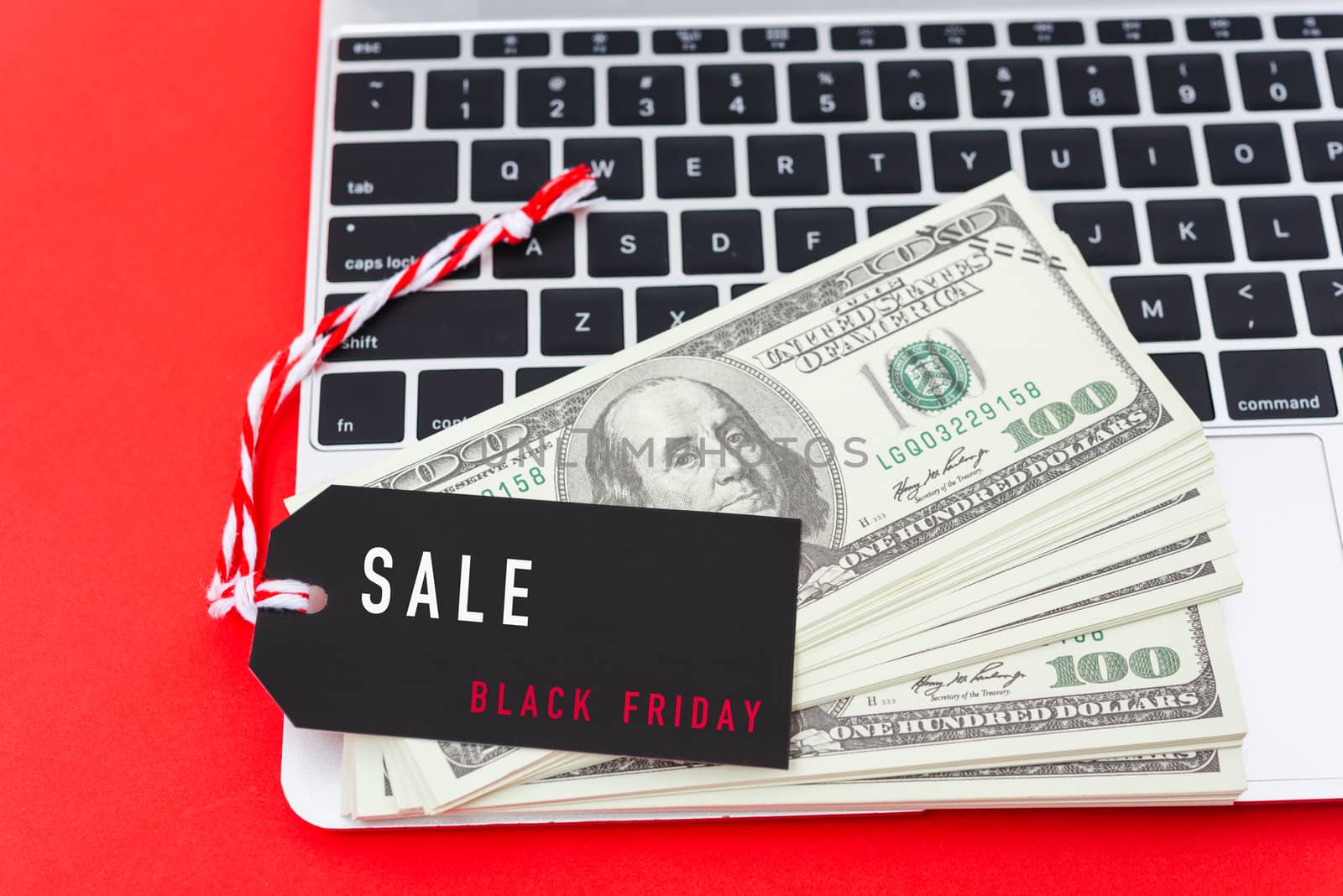 Online shopping Black Friday sale text on Promotion Black tag label on laptop computer, with copy space