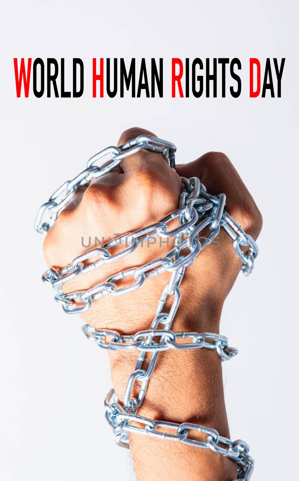 Chained fist hands with WORLD HUMAN RIGHTS DAY text on white background, Human rights day concept
