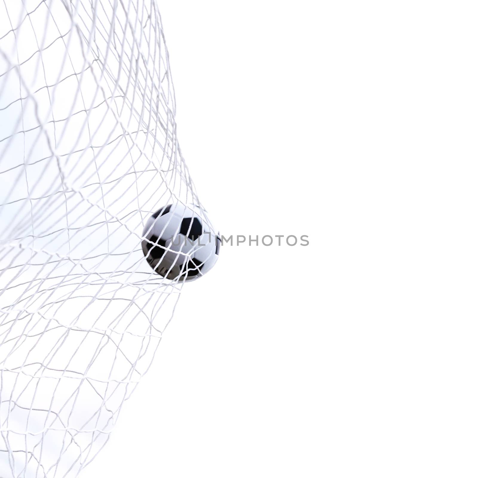 Studio shot moving soccer ball in goal net isolated on white by trongnguyen