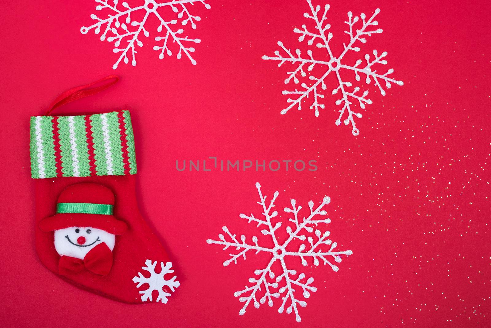 Stocking decoration in christmas holiday on red background