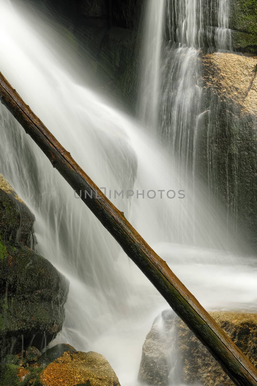 Beautiful view of Potoka Falls in super green forest surroundings, Czech Republic