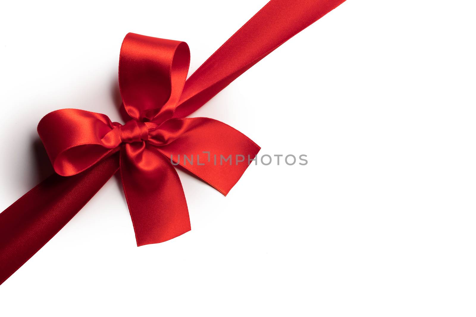 Red gift bow isolated on white background holiday gift concept